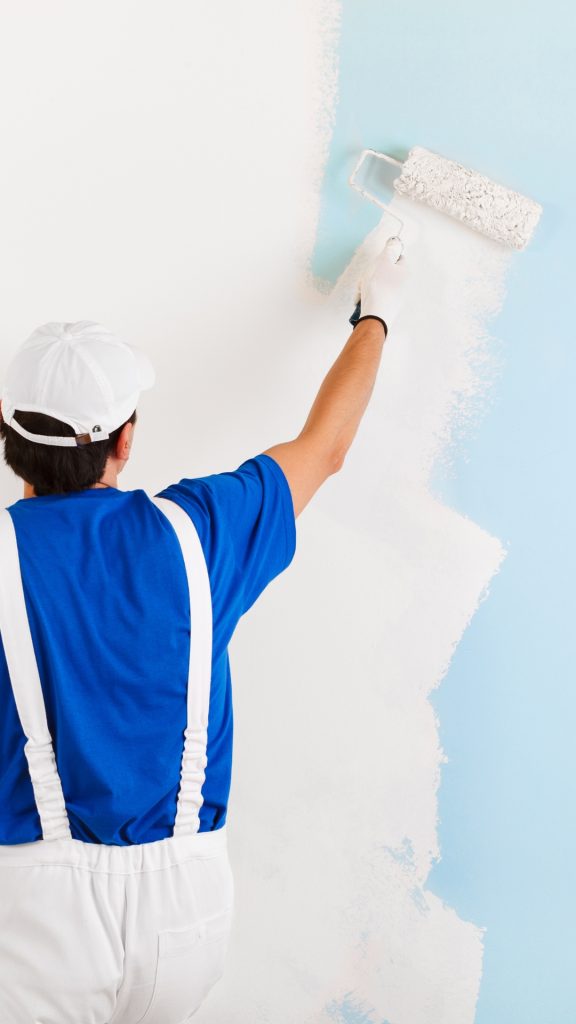 Painting contractors Northern Suburbs finishing a warehouse or office exterior coating in Milnerton.